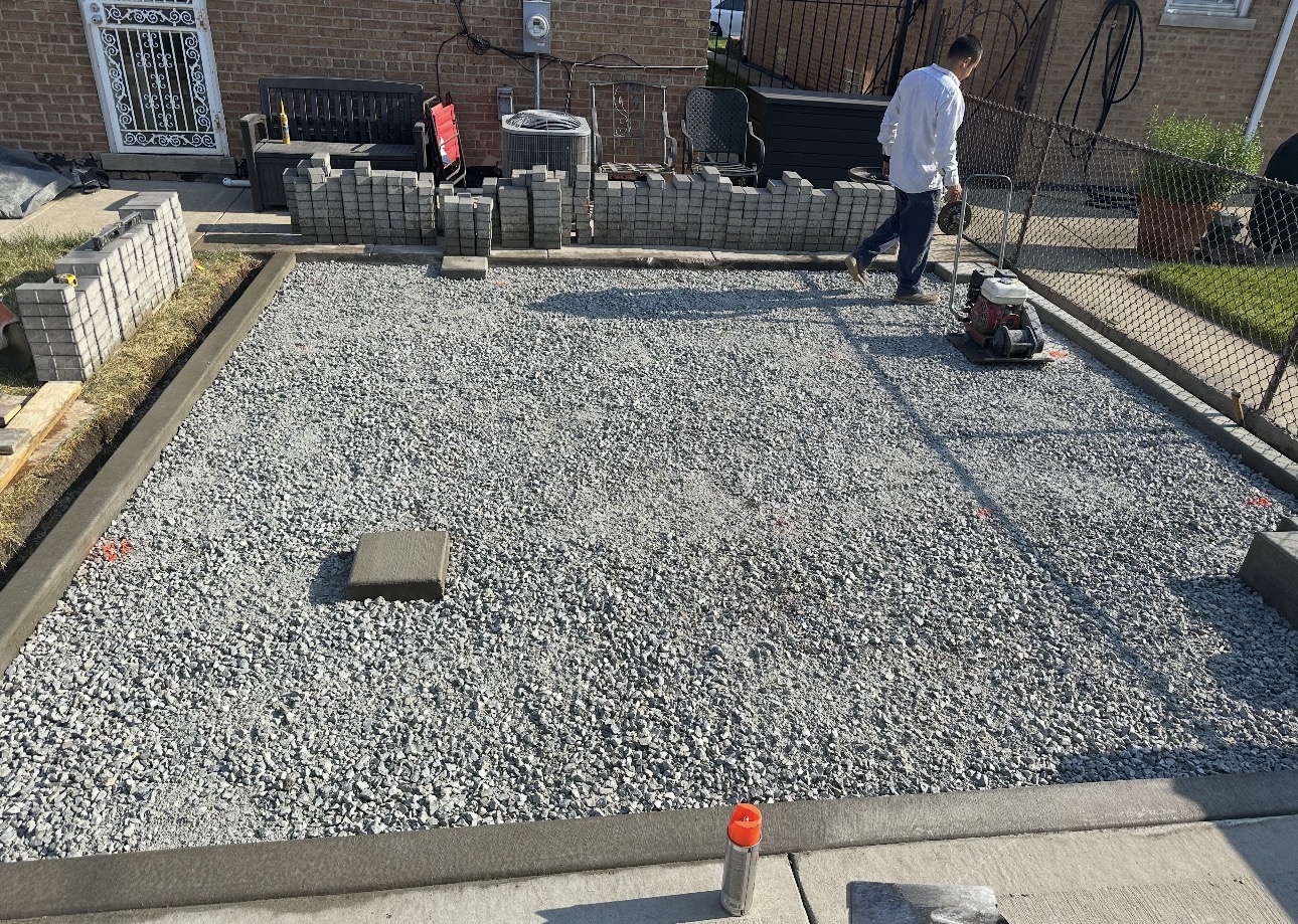 Paver patio site prep with compacted gravel base